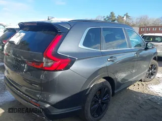 2025 Honda CR-V Sport Touring with VIN 2HKRS6H9XSH807901, listed as a IAAI auction lot 41172801 with 5,390 mi miles and . Bid and sale history available at DreamBid. Image 4.