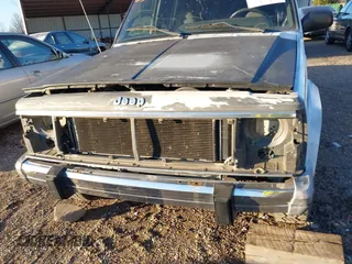 2001 Jeep Cherokee Sport with VIN 1J4FT48S01L528968, listed as a IAAI auction lot 41488259 with 230,482 mi miles. Bid and sale history available at carsss.com. Image 6.