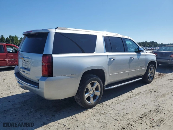 2017 Chevrolet Suburban Premier with VIN 1GNSCJKC8HR232986, listed as a Copart auction lot 70196684 with 89,834 mi miles and Salvage Title. Bid and sale history available at carsss.com. Image 3.