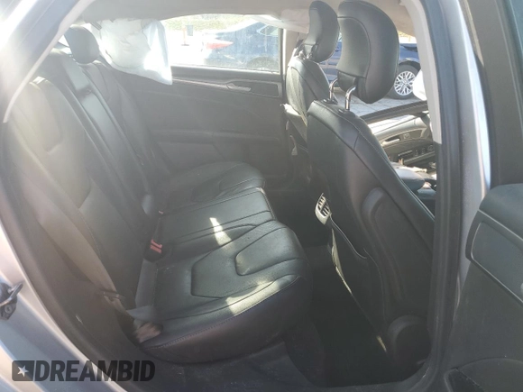 2014 Ford Fusion Titanium with VIN 3FA6P0K90ER228580, listed as a Copart auction lot 49986585 with Not Provided miles and Salvage Title. Bid and sale history available at DreamBid. Image 10.