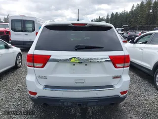 2013 Jeep Grand Cherokee Limited with VIN 1C4RJFBT0DC619216, listed as a IAAI auction lot 41703137 with 142,577 mi miles. Bid and sale history available at carsss.com. Image 16.