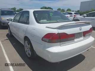 2002 Honda Accord EX z VIN 1HGCG16542A053039, wystawiony jako IAAI lot #42308687 z przebiegiem 206 864 mil mil oraz . Historia ofert i sprzedaży dostępna na DreamBid. Obrazek 3.