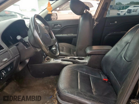 2012 Ford Fusion SEL z VIN 3FAHP0JGXCR426220, wystawiony jako Copart lot #59346985 z przebiegiem 151 397 mil mil oraz Szkoda całkowita • Salvage title. Historia ofert i sprzedaży dostępna na DreamBid. Obrazek 7.