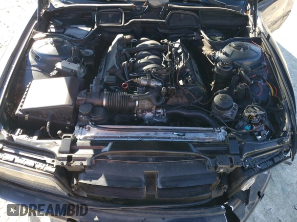 1997 BMW 7 Series 740il with VIN WBAGJ8327VDL42579, listed as a Copart auction lot 42023485 with 143,882 mi miles and Salvage Title. Bid and sale history available at carsss.com. Image 12.