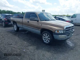 2001 Dodge 2500 with VIN 1B7KC23651J224436, listed as a IAAI auction lot 42013282 with 218,831 mi miles. Bid and sale history available at carsss.com. Image 1.