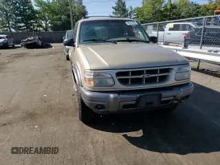 2000 Ford Explorer XLT z VIN 1FMDU83P1YZC26628, wystawiony jako Copart lot #69201664 z przebiegiem 219 384 mil mil oraz Nie do naprawy • Non repairable. Historia ofert i sprzedaży dostępna na DreamBid. Obrazek 10.