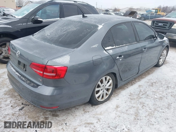 2015 Volkswagen Jetta Sport with VIN 3VWD17AJ6FM319596, listed as a IAAI auction lot 41370591 with 92,818 mi miles and . Bid and sale history available at DreamBid. Image 4.