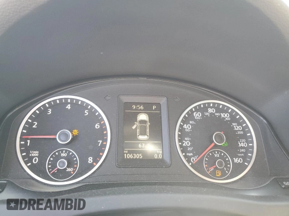 2015 Volkswagen Tiguan SE with VIN WVGAV7AX2FW094359, listed as a Copart auction lot 60101885 with 106,305 mi miles and Salvage title. Bid and sale history available at DreamBid. Image 9.