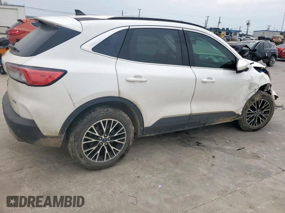 2022 Ford Escape Titanium Plug-In Hybrid с VIN 1FMCU0LZ2NUA89898, выставлен на аукционе Copart как лот 53209685 с пробегом 102 991 миль миль и Списание • Salvage title. История ставок и продаж доступна на DreamBid. Изображение 3.