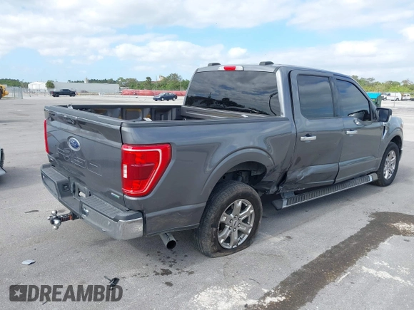 2021 Ford F-150 XL with VIN 1FTEW1CPXMFD00974, listed as a IAAI auction lot 41093772 with 112,890 mi miles and . Bid and sale history available at carsss.com. Image 4.