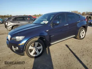 2014 BMW X6 50i z VIN 5UXFG8C53EL592803, wystawiony jako Copart lot #79621904 z przebiegiem 154 595 mil mil oraz Szkoda całkowita • Salvage title. Historia ofert i sprzedaży dostępna na DreamBid. Obrazek 1.