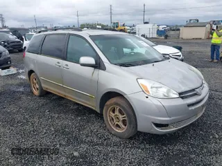 2004 Toyota Sienna XLE with VIN 5TDZA22C14S076563, listed as a IAAI auction lot 41980606 with 195,007 mi miles. Bid and sale history available at carsss.com. Image 1.