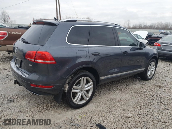 2012 Volkswagen Touareg Sport z VIN WVGFK9BP6CD005005, wystawiony jako Copart lot #46802355 z przebiegiem 141 430 mil mil oraz Czysty tytuł • Clean title. Historia ofert i sprzedaży dostępna na DreamBid. Obrazek 3.