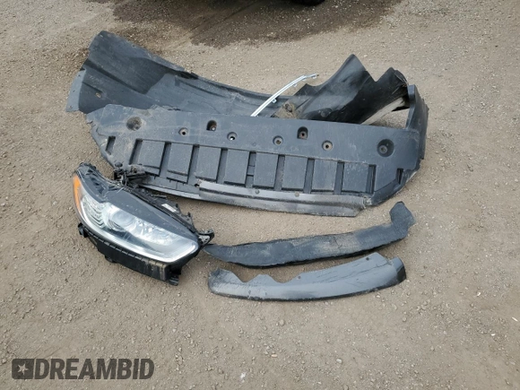 2015 Ford Fusion SE z VIN 3FA6P0H73FR259880, wystawiony jako Copart lot #61133835 z przebiegiem Nie podano mil oraz Szkoda całkowita • Salvage title. Historia ofert i sprzedaży dostępna na DreamBid. Obrazek 12.