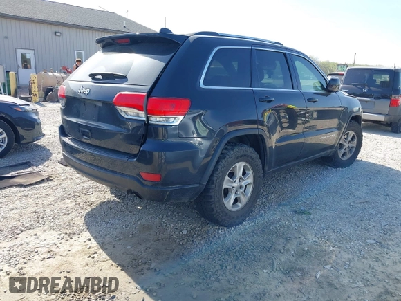 2014 Jeep Grand Cherokee Laredo with VIN 1C4RJEAG0EC442053, listed as a IAAI auction lot 42098601 with 200,982 mi miles and . Bid and sale history available at DreamBid. Image 4.