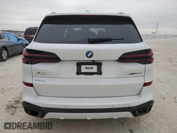 2024 BMW X5 xDrive50e with VIN 5UX43EU08R9S61979, listed as a Copart auction lot 46272895 with 8,303 mi miles and Salvage Title. Bid and sale history available at carsss.com. Image 6.
