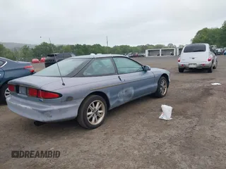 1995 Ford Probe z VIN 1ZVLT20A6S5154983, wystawiony jako IAAI lot #42301574 z przebiegiem 128 515 mil mil oraz . Historia ofert i sprzedaży dostępna na DreamBid. Obrazek 4.