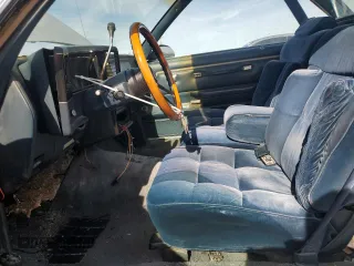 1987 GMC Caballero z VIN 3GTCW80HXHS801670, wystawiony jako Copart lot #42805895 z przebiegiem 60 195 mil mil oraz Szkody całkowita. Historia ofert i sprzedaży dostępna na DreamBid. Obrazek 7.