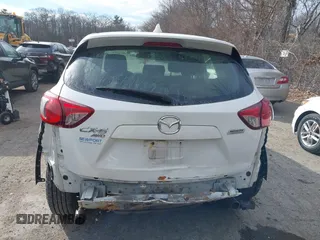 2013 Mazda CX-5 Sport with VIN JM3KE4BE5D0165212, listed as a IAAI auction lot 41332056 with 150,301 mi miles. Bid and sale history available at carsss.com. Image 17.