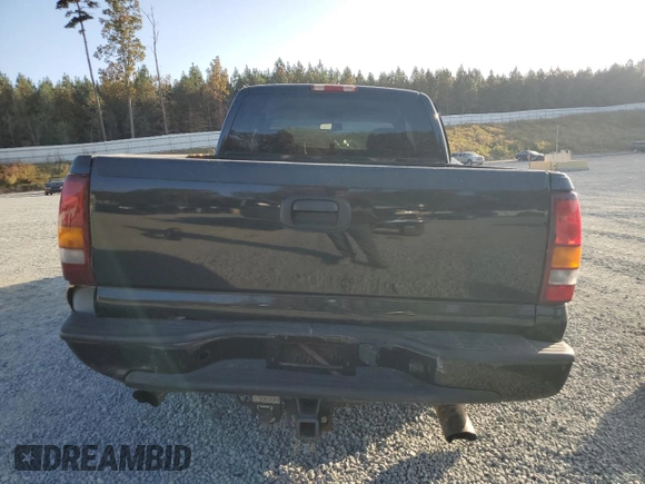 2003 GMC Sierra Denali z VIN 2GTFK69U031261036, wystawiony jako Copart lot #75353324 z przebiegiem 192 762 mil mil oraz Szkody całkowita. Historia ofert i sprzedaży dostępna na DreamBid. Obrazek 6.