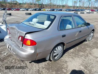 1999 Toyota Corolla VE with VIN 2T1BR12E0XC103688, listed as a IAAI auction lot 41938086 with 203,600 mi miles and . Bid and sale history available at DreamBid. Image 4.