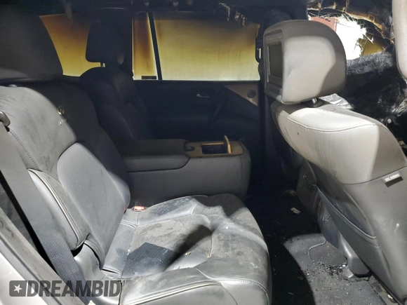 2013 Infiniti QX56 z VIN JN8AZ2NF2D9550941, wystawiony jako Copart lot #70451624 z przebiegiem Nie podano mil oraz Szkoda całkowita • Salvage title. Historia ofert i sprzedaży dostępna na DreamBid. Obrazek 11.