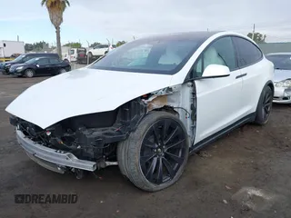 2023 Tesla Model X with VIN 7SAXCBE54PF384403, listed as a IAAI auction lot 40947187 with 16,881 mi miles and . Bid and sale history available at DreamBid. Image 20.