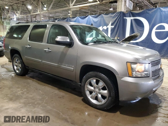 2007 Chevrolet Suburban LTZ with VIN 3GNFK16Y47G309457, listed as a Copart auction lot 88775185 with 185,056 mi miles and Clean Title. Bid and sale history available at DreamBid. Image 4.