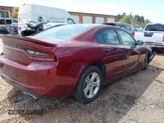 2019 Dodge Charger SXT with VIN 2C3CDXBG1KH698786, listed as a IAAI auction lot 41922507 with 108,666 mi miles. Bid and sale history available at carsss.com. Image 4.