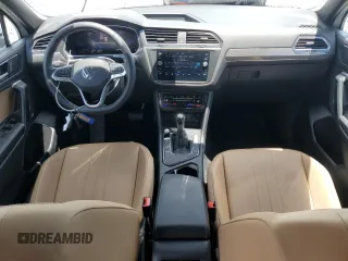 2023 Volkswagen Tiguan SE with VIN 3VV3B7AX6PM130952, listed as a Copart auction lot 56614335 with 24,996 mi miles and Salvage title. Bid and sale history available at DreamBid. Image 8.