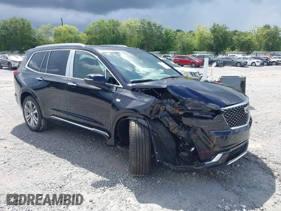 2022 Cadillac XT6 Premium Luxury with VIN 1GYKPCRS4NZ145145, listed as a IAAI auction lot 42533642 with 36,450 mi miles and . Bid and sale history available at DreamBid. Image 1.