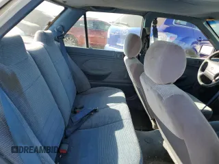 1994 Ford Escort z VIN 3FARP13J4RR122084, wystawiony jako Copart lot #73184804 z przebiegiem 238 604 mil mil oraz Nie do naprawy. Historia ofert i sprzedaży dostępna na DreamBid. Obrazek 10.