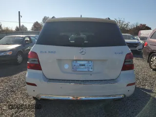 2010 Mercedes-Benz GLK 350 with VIN WDCGG8HB4AF430749, listed as a Copart auction lot 77002264 with 57,640 mi miles and Salvage Title. Bid and sale history available at DreamBid. Image 6.