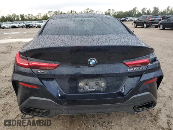 2022 BMW 8 Series M850i z VIN WBAGV8C02NCH18326, wystawiony jako Copart lot #78362624 z przebiegiem 21 393 mil mil oraz Szkody całkowita. Historia ofert i sprzedaży dostępna na DreamBid. Obrazek 6.