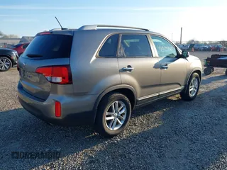 2014 Kia Sorento LX with VIN 5XYKT3A63EG503284, listed as a IAAI auction lot 41814383 with 166,219 mi miles and . Bid and sale history available at DreamBid. Image 4.