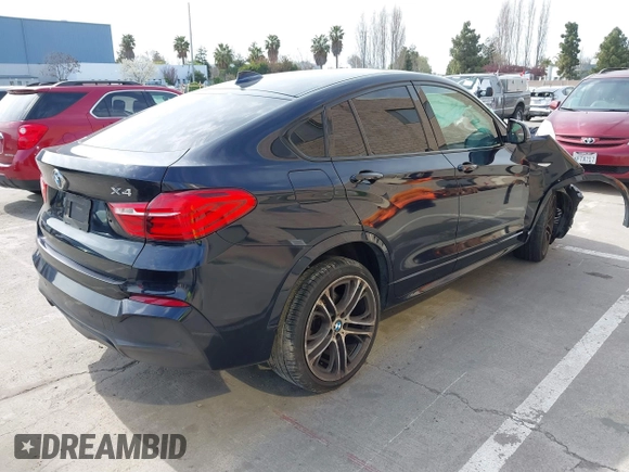 2015 BMW X4 xDrive35i with VIN 5UXXW5C50F0E87728, listed as a IAAI auction lot 41819628 with 136,042 mi miles and . Bid and sale history available at DreamBid. Image 4.