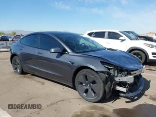 2023 Tesla Model 3 z VIN 5YJ3E1EA9PF680921, wystawiony jako IAAI lot #42170477 z przebiegiem 10 428 mil mil oraz . Historia ofert i sprzedaży dostępna na DreamBid. Obrazek 1.
