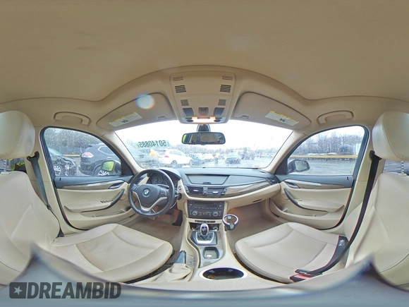 2014 BMW X1 xDrive28i with VIN WBAVL1C52EVY15236, listed as a Copart auction lot 50140885 with 141,088 mi miles and Salvage Title. Bid and sale history available at carsss.com. Image 13.