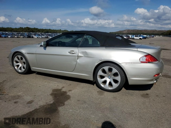 2007 BMW 6 Series 650i with VIN WBAEK13507CN84404, listed as a Copart auction lot 73525244 with 156,497 mi miles and Salvage Title. Bid and sale history available at DreamBid. Image 2.