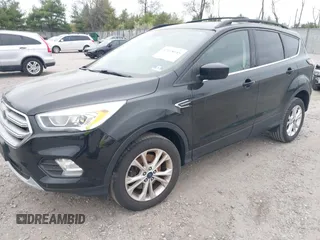 2017 Ford Escape SE with VIN 1FMCU9GD0HUC58128, listed as a IAAI auction lot 42078045 with 125,503 mi miles. Bid and sale history available at carsss.com. Image 17.