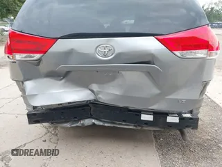 2013 Toyota Sienna LE AAS with VIN 5TDKK3DC7DS332092, listed as a IAAI auction lot 42676665 with 121,481 mi miles and . Bid and sale history available at DreamBid. Image 6.