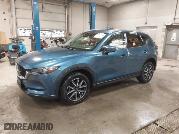 2018 Mazda CX-5 S Premium with VIN JM3KFBDMXJ1376045, listed as a IAAI auction lot 41813968 with 90,378 mi miles and . Bid and sale history available at DreamBid. Image 2.