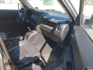 2015 Jeep Patriot High Altitude with VIN 1C4NJRFB2FD168448, listed as a IAAI auction lot 42171207 with 158,846 mi miles and . Bid and sale history available at carsss.com. Image 5.