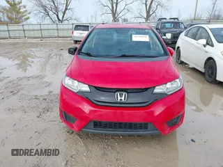 2015 Honda Fit LX z VIN 3HGGK5H54FM728448, wystawiony jako IAAI lot #41538650 z przebiegiem 115 450 mil mil oraz . Historia ofert i sprzedaży dostępna na DreamBid. Obrazek 12.