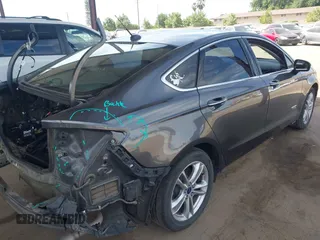 2016 Ford Fusion Titanium with VIN 3FA6P0SU9GR134575, listed as a IAAI auction lot 42338427 with 123,765 mi miles and . Bid and sale history available at DreamBid. Image 4.