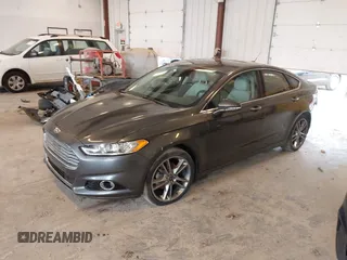 2016 Ford Fusion Titanium with VIN 3FA6P0D9XGR223354, listed as a IAAI auction lot 42621924 with Not provided miles and . Bid and sale history available at DreamBid. Image 2.