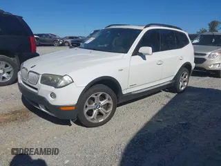 2009 BMW X3 xDrive30i with VIN WBXPC93499WJ30722, listed as a IAAI auction lot 41862997 with 170,028 mi miles. Bid and sale history available at carsss.com. Image 2.