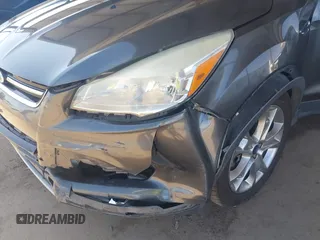 2015 Ford Escape Titanium with VIN 1FMCU0J92FUA20469, listed as a IAAI auction lot 42510293 with 161,466 mi miles and . Bid and sale history available at DreamBid. Image 6.
