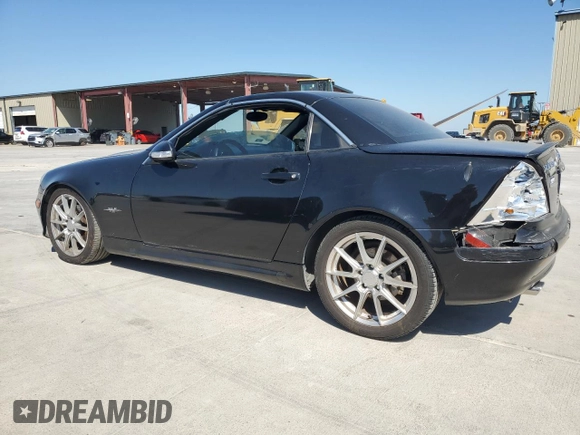 2004 Mercedes-Benz SLK-Class with VIN WDBKK65F24F306069, listed as a Copart auction lot 68791864 with 99,835 mi miles and Salvage Title. Bid and sale history available at carsss.com. Image 2.
