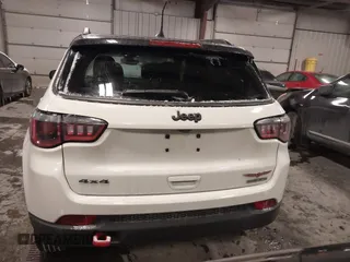2018 Jeep Compass Trailhawk with VIN 3C4NJDDB2JT328269, listed as a IAAI auction lot 41597957 with 66,789 mi miles and . Bid and sale history available at carsss.com. Image 16.